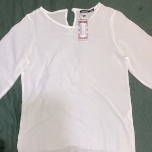 White blouse from boohoo with tags still intact!
